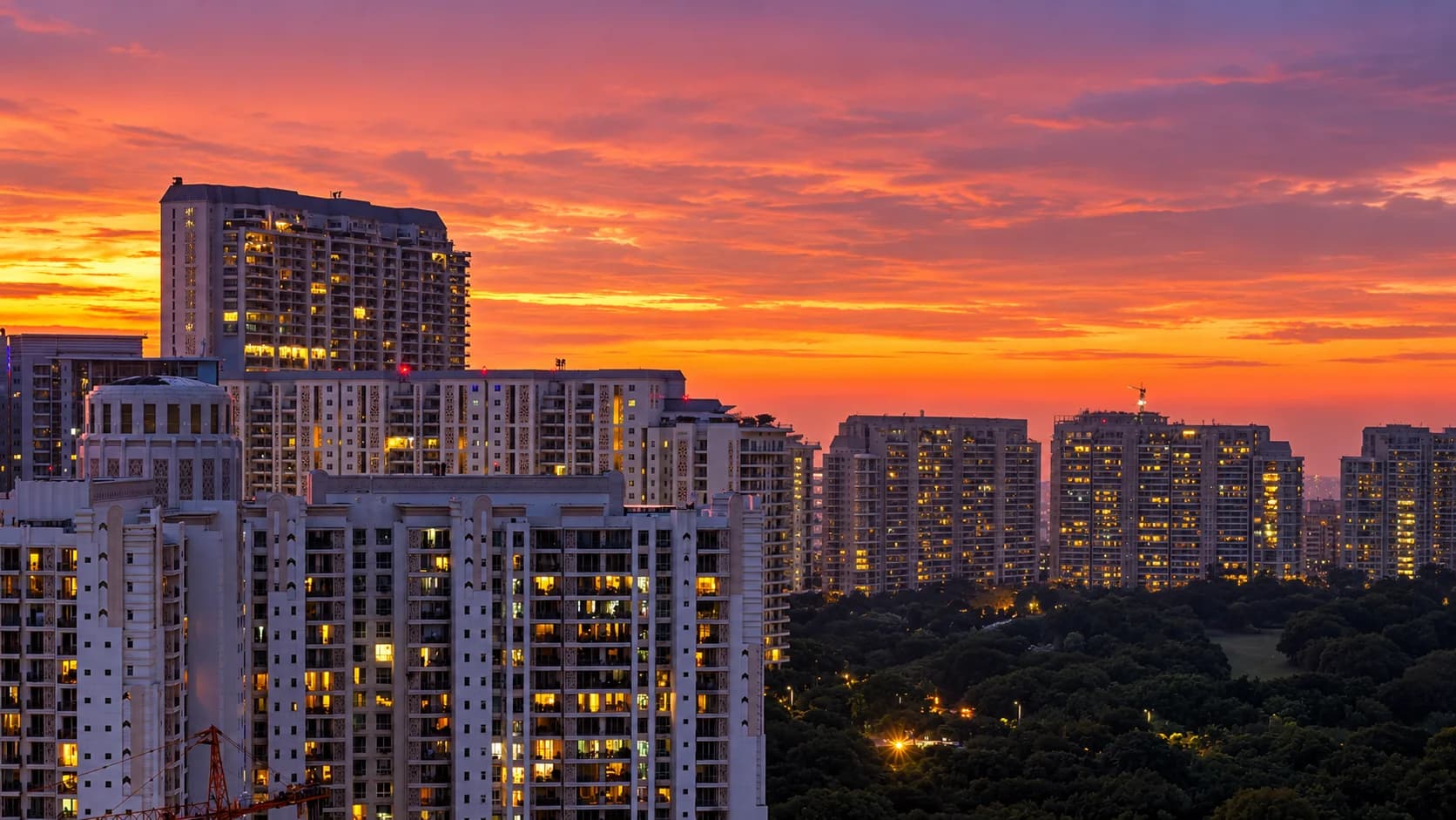 Gurgaon high-rise residential towers at sunset